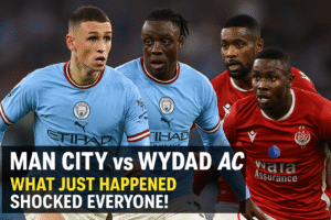 Manchester City players Phil Foden and Jérémy Doku face off against Wydad AC players during FIFA Club World Cup 2025 match, intense expressions and bold headline text included.